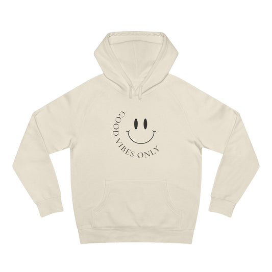 Front view of ecru AS Colour 5101 hoodie with black minimalist “Good Vibes Only” smiley print.